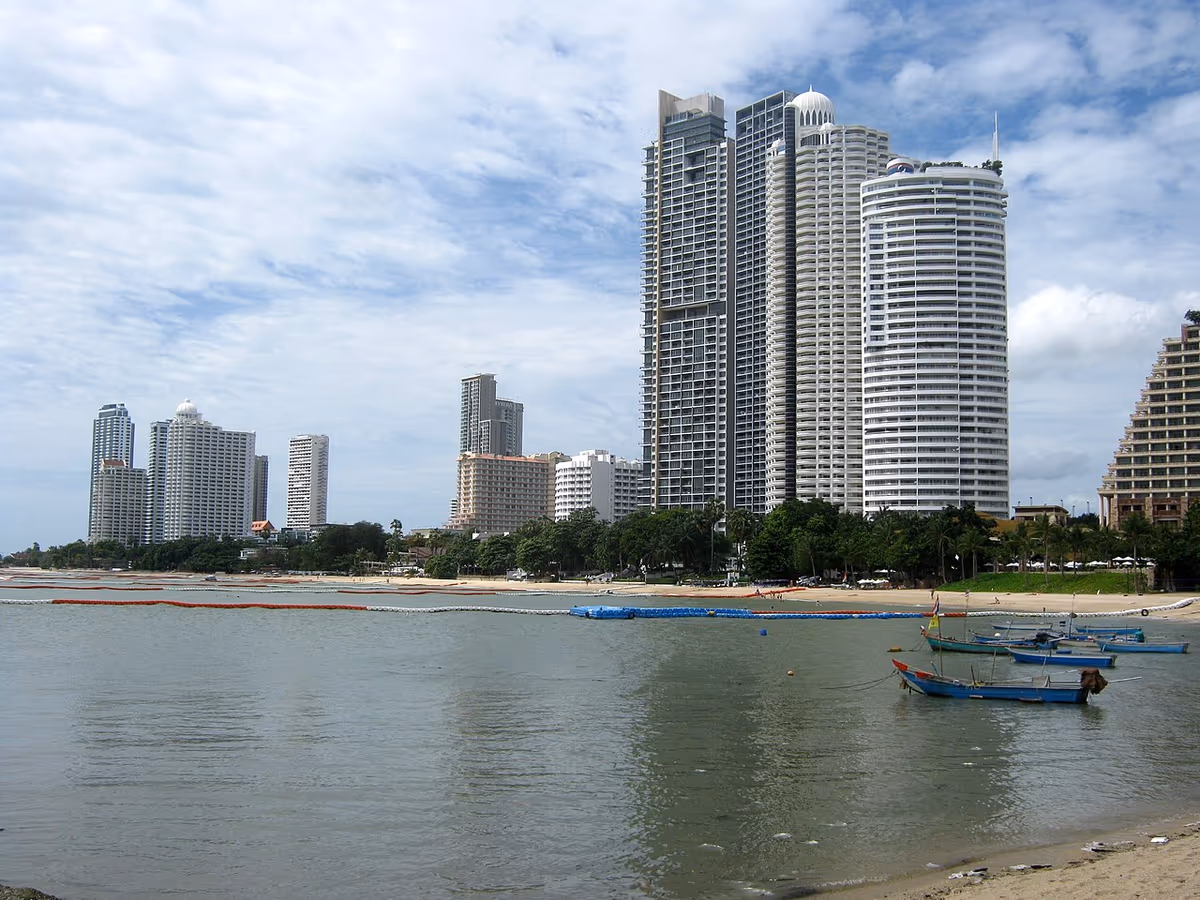 High-rise condominiums and fishing boats on Wong Amat Beach, Naklua, Pattaya